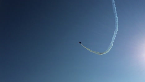 air show loop and rise, propeller stunt pilot plane over drava river in maribor, slovenia, hd