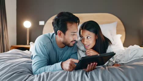 Couple,-bed-and-tablet-at-night-with-internet