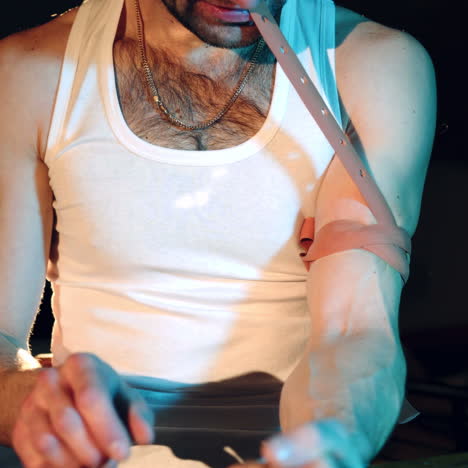 man is a drug addict preparing to inject drugs. concept of social problems of drug addiction and crime.