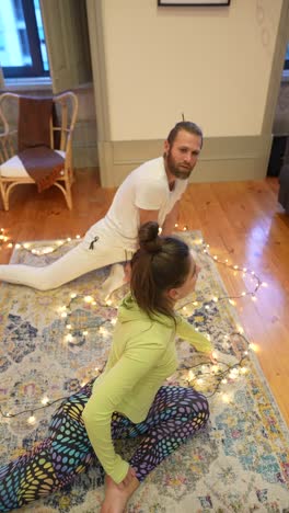 couple practicing yoga at home