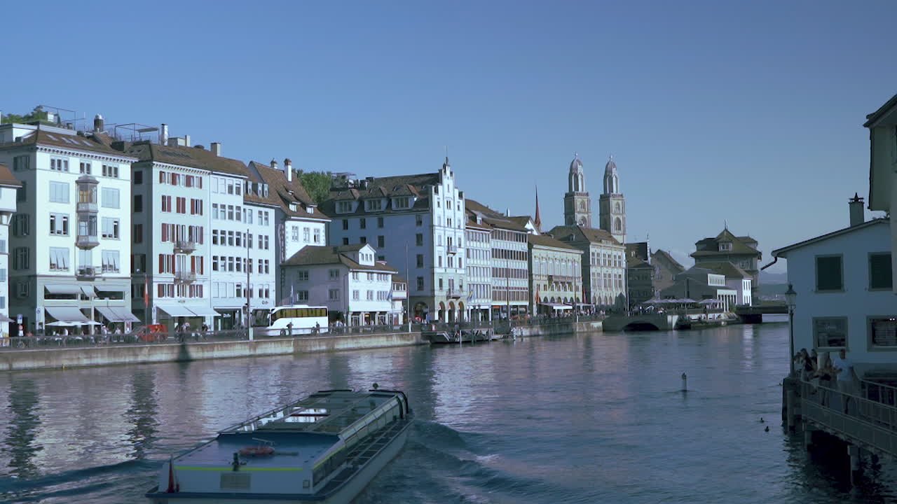 View of historic Zurich city center with famous Fraumunster and Grossmunster Churches and river Limmat at Lake Zurich, Canton of Zurich, Switzerland