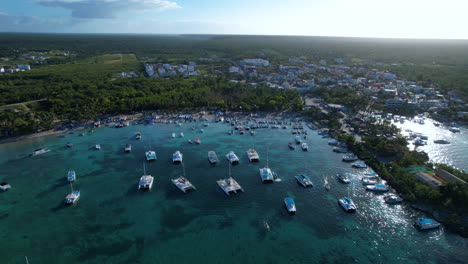 epic seashore view with boats and hotels in the backoung, touristic place in the caribbean