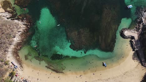 Coral-reefs-and-shoals-at-Playa-La-Entrega,-Huatulco-Oaxaca,-aerial-view