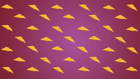 Animación-Digital-De-Múltiples-Iconos-De-Aviones-De-Papel-Amarillo-Flotando-Sobre-Fondo-Rosa