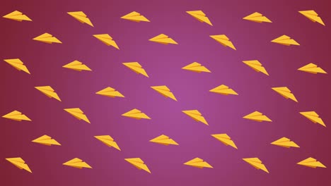 animación digital de múltiples iconos de aviones de papel amarillo flotando contra un fondo rosado