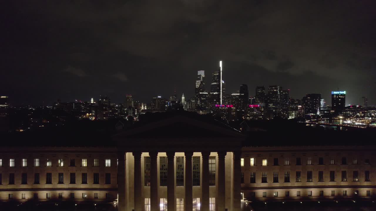 4K Drone Shot of Philadelphia Art Museum at Night - Rising to Show City