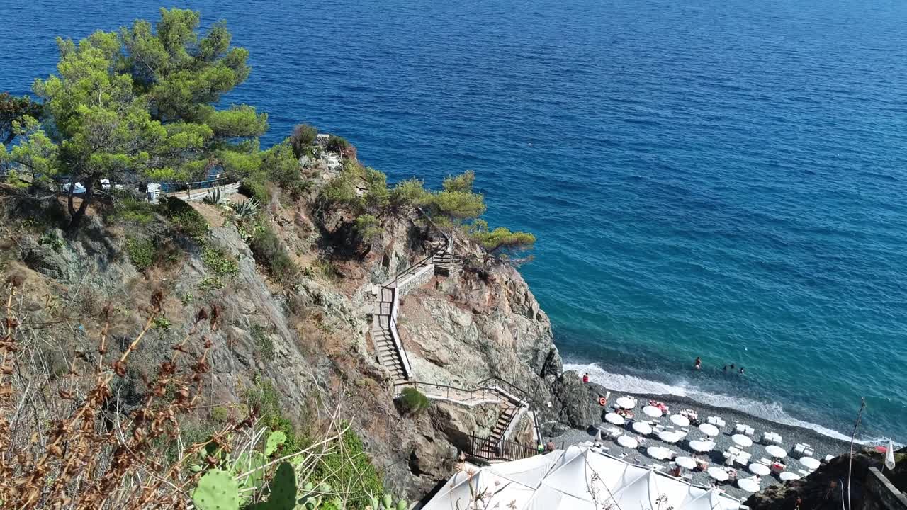 Tourist swimming in beautiful Lagoon in the Ocean near Genoa Italy