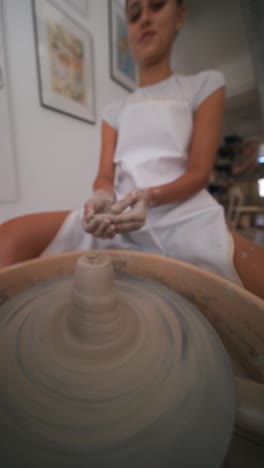 hands-on pottery making: shaping clay on the wheel
