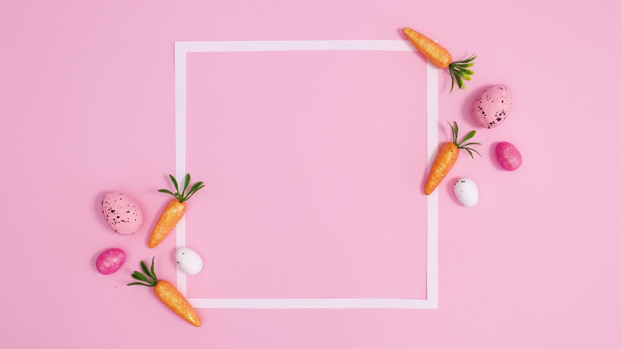 부활절 달과 당근은 파스텔 분홍색 배경에 공간 프레임을 복사 주변으로 이동.