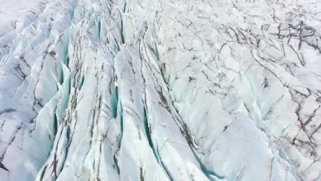 the 4k drone captures distinctive aerial cinematic shots of glaciers within iceland national park, their jagged forms resembling sharp ice blades