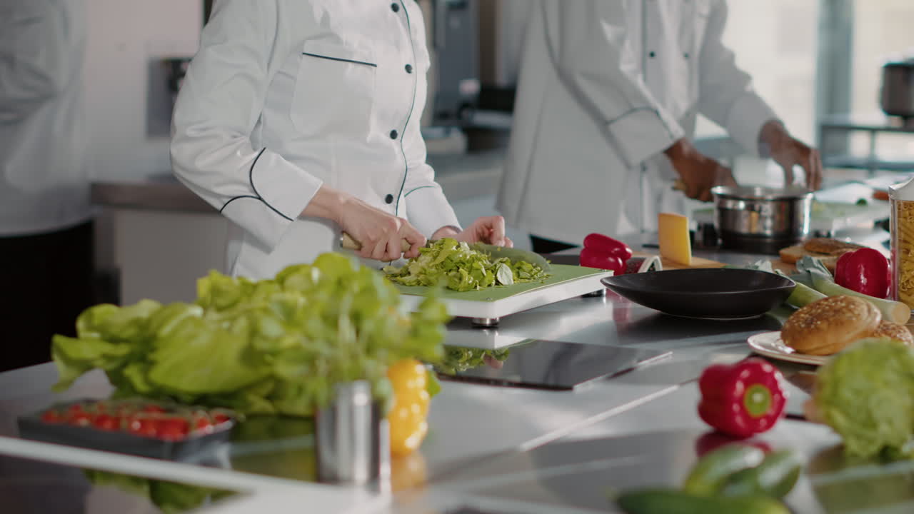Portrait of authentic chef preparing organic ingredients in kitchen