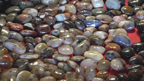 small shiny stones on display at souvenir market in antananarivo, madagascar