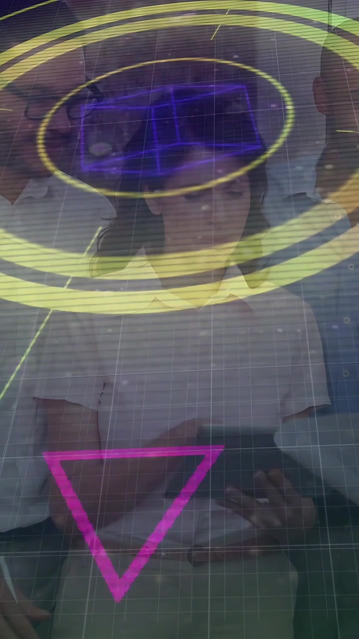 Vertical video: Team lead woman tapping tablet, animating AR rings into thin grid for business demo