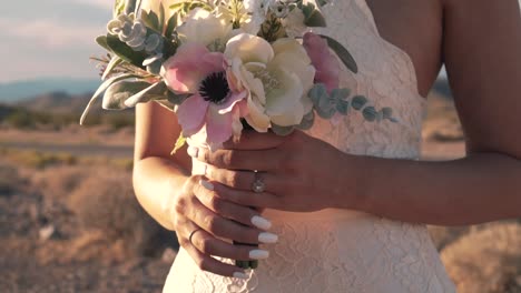 Pan-across-bride-slow-motion-at-sunset