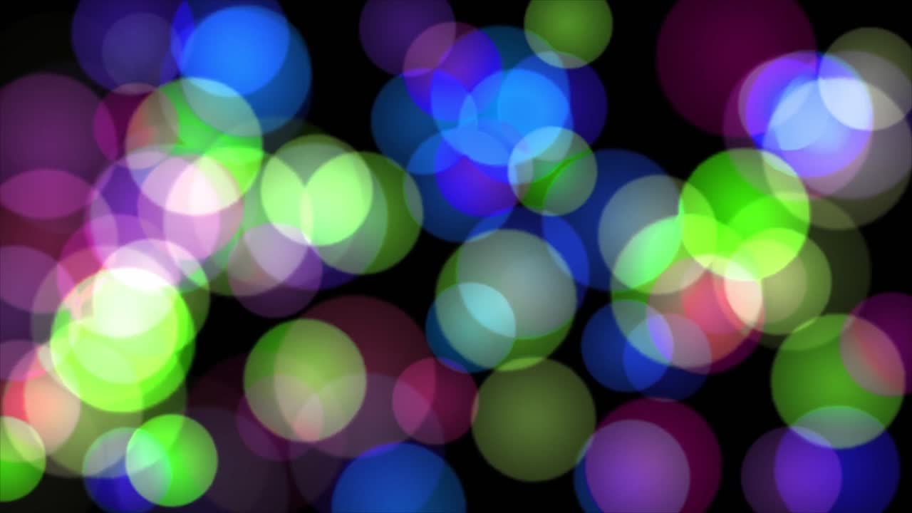 Luci Bokeh Colorate in Movimento su Sfondo Nero.