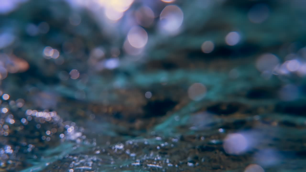Underwater view of the waves and the bubbles of the red sea