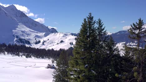 Incredible-Aerial-Nature-View-Sörenberg-Ski-Resort-with-Snow-in-Winter---Top-Destination-for-Families-in-UNESCO-Biosphere-Entlebuch-|-Switzerland-by-drone