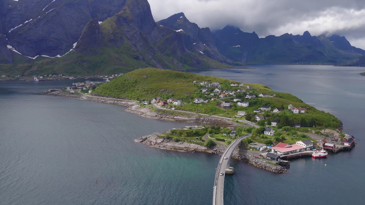 Drone shot of Reine and Hamnoy in Lofoten Islands in Norway during summer 4k
