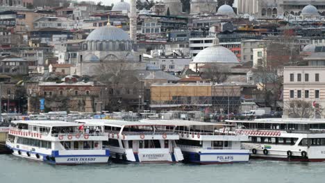 istanbul waterfront with ferries and mosques