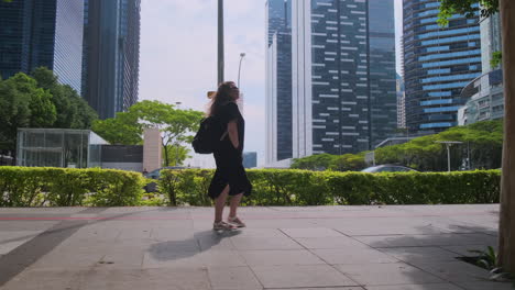 woman walking in a city