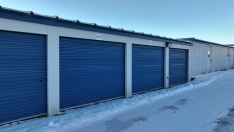 blue self storage unit buildings or warehouse temporary storage in winter