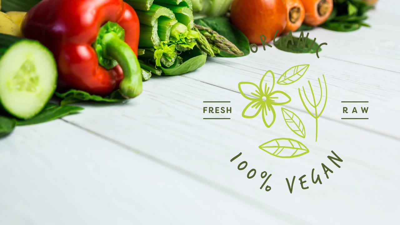 Animation af tekst '100 procent vegansk' i grøn over friske økologiske grøntsager på træplanker