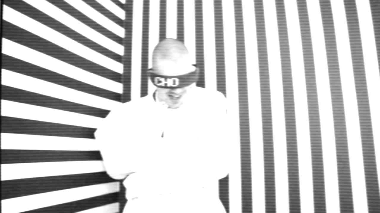 Bound Figure in a Striped Room