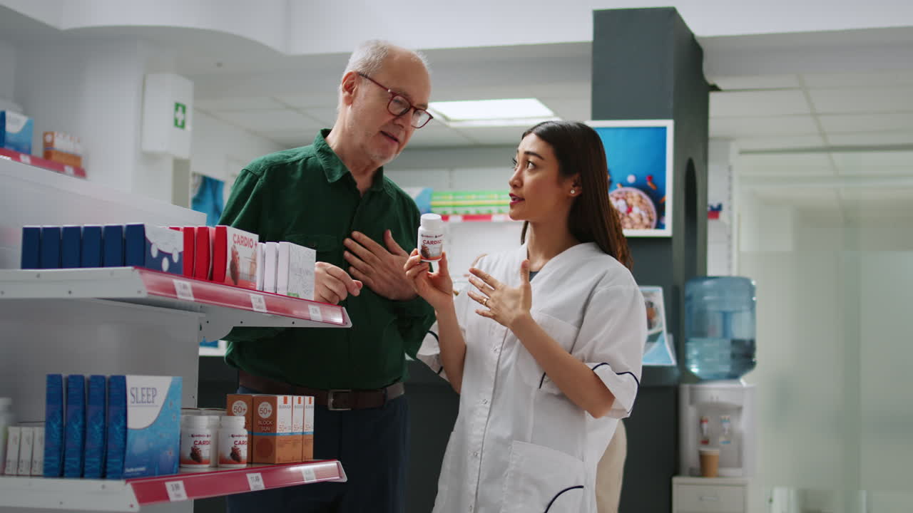 Pharmacist assisting customer in a pharmacy