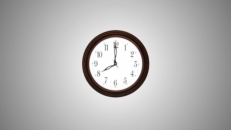 A round clock mounted to the side. Timelapse 4k
