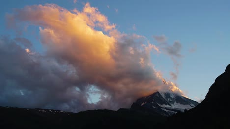 timelapse of clouds moving around the matterhorn at sunset - zermatt, switzerland