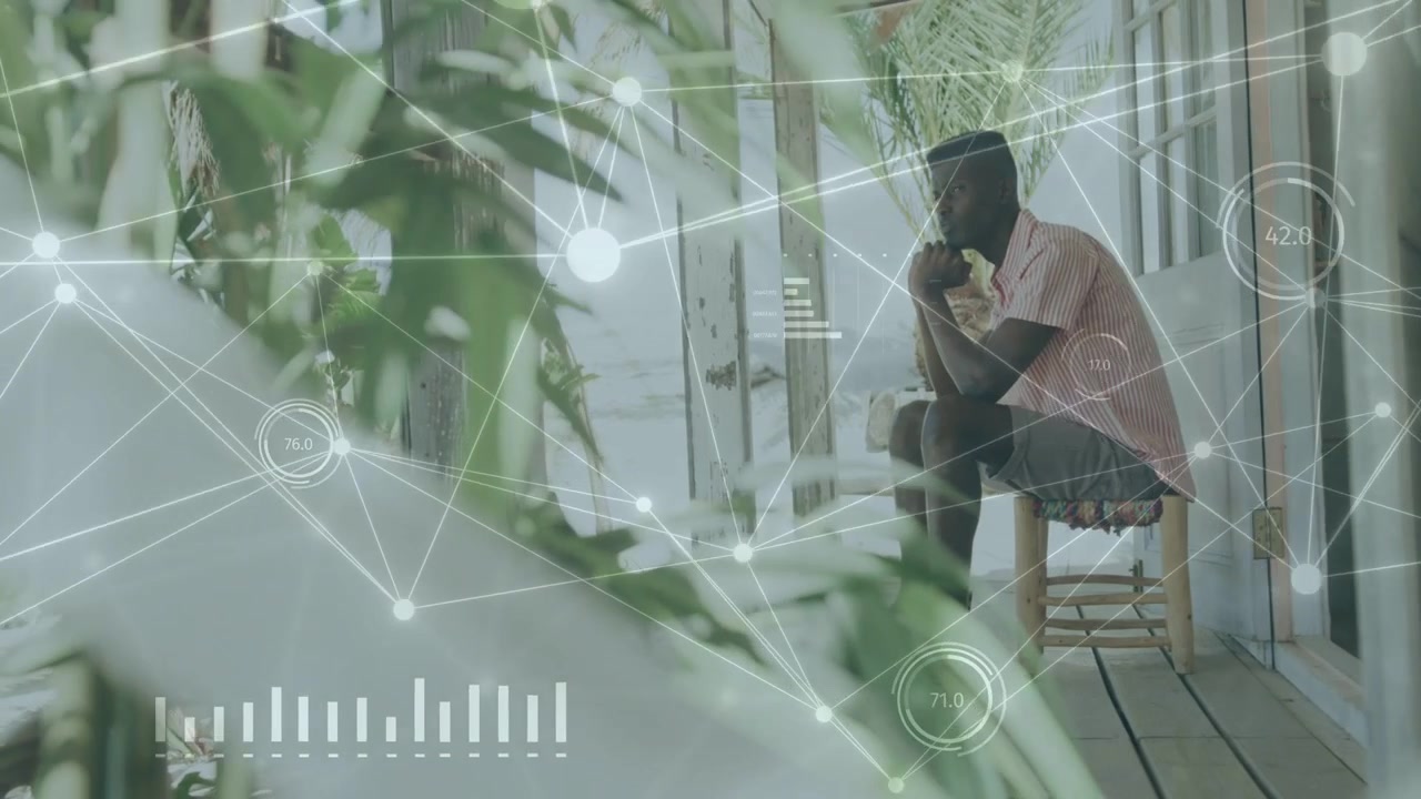 Man sitting on porch, leaves moving showing figure, HUD nodes and charts growing, reading tech data
