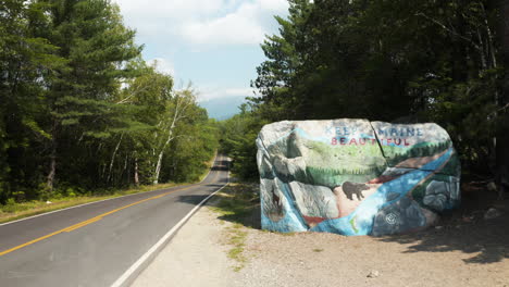 slow push forwards towards keep maine beautiful rock outside baxter state park, maine