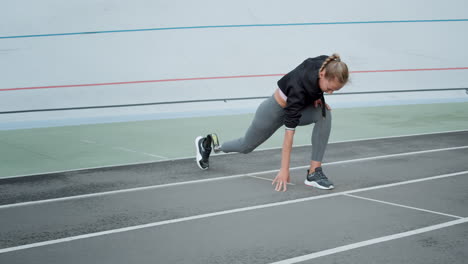 athlete warming at stadium