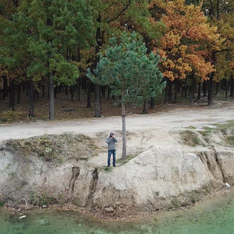 photographer working on shore