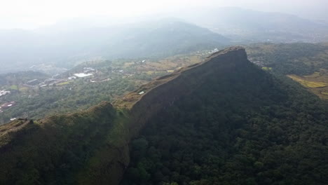 aerial: fortified walls of vinchu kada at lohagad fort in rural india