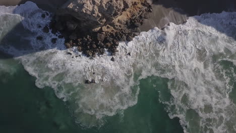 overhead drone shot of sea wave