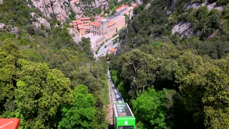 the funicular railway descends to the montserrat catholic monastery in spain