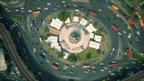 4k cinematic urban drone footage of an aerial panoramic smoky view of the victory monument roundabout in the middle of downtown bangkok, thailand during burning season