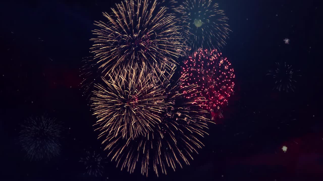 el fondo de la animación de bucle del espectáculo de fuegos artificiales de brillo dorado.