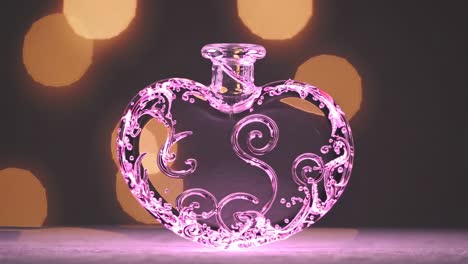 heart-shaped pink glass bottle with bokeh background
