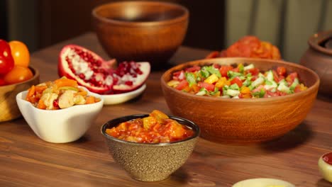 moroccan cuisine. traditional dishes, vegetable salad. middle eastern culture. homemade food. bowls with sauces and cold appetizer.