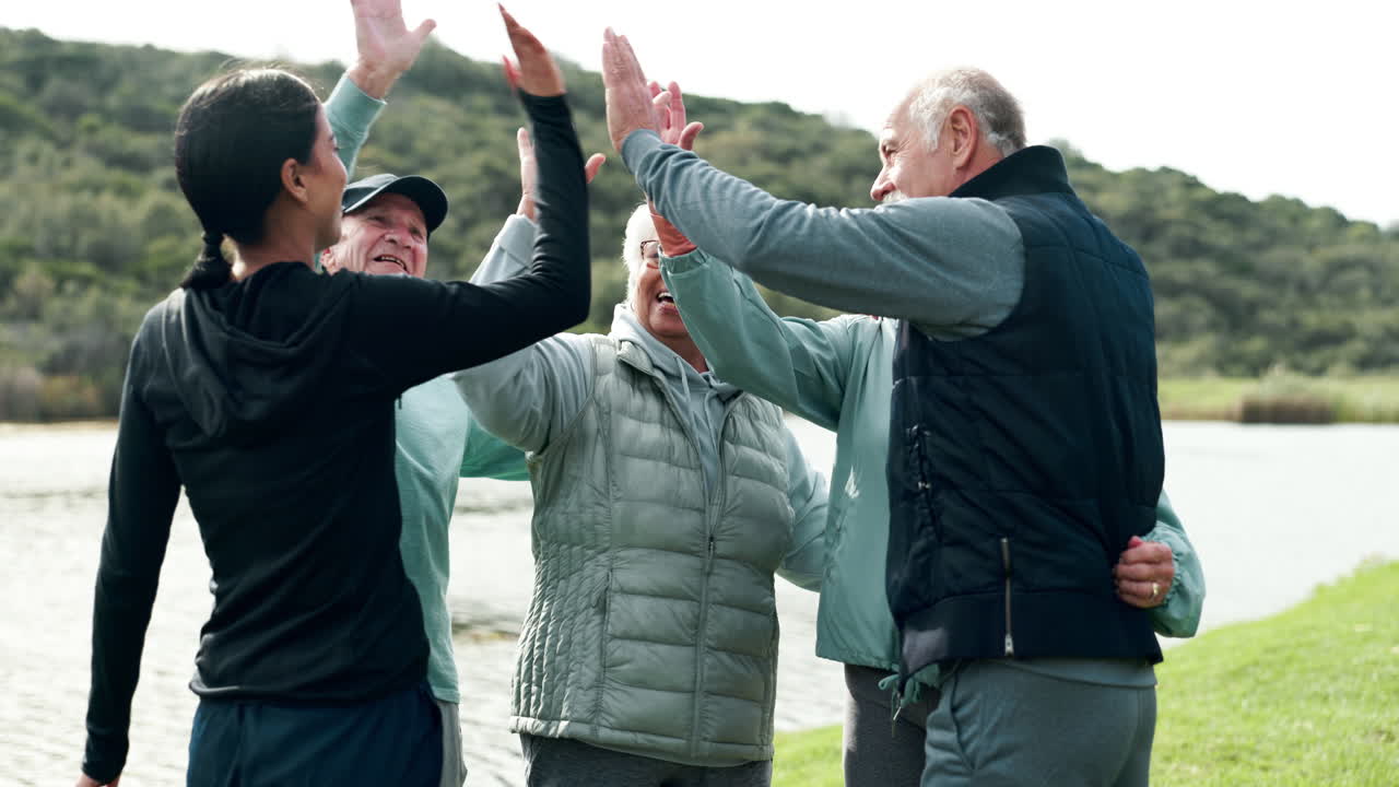 Group of Seniors Exercising Together Outdoors