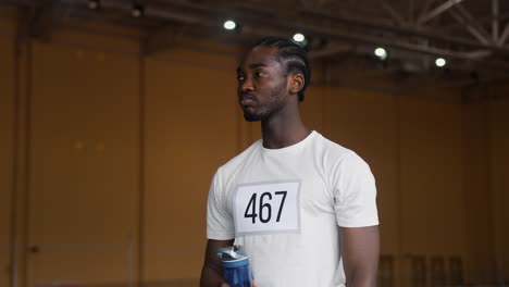 young man drinking water