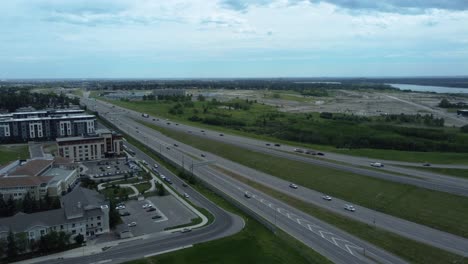 busy traffic on glenmore trail with grey eagle casino in the background – calgary, alberta