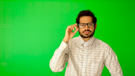 Indian-guy-express-emotion-with-green-background-green-screen