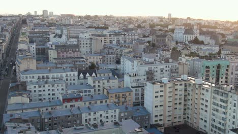 Dramatic-spinning-drone-shot-over-urban-area-in-Brest,-France