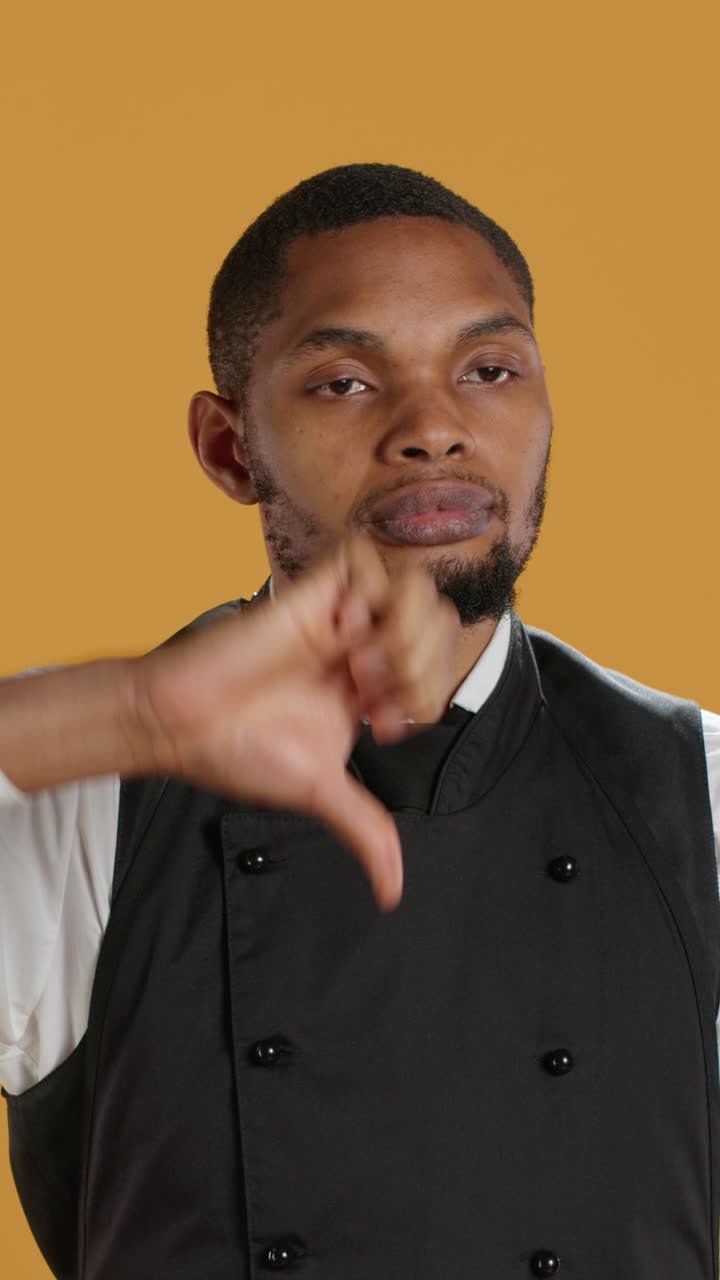 African American Chef Showing Thumbs Down Gesture