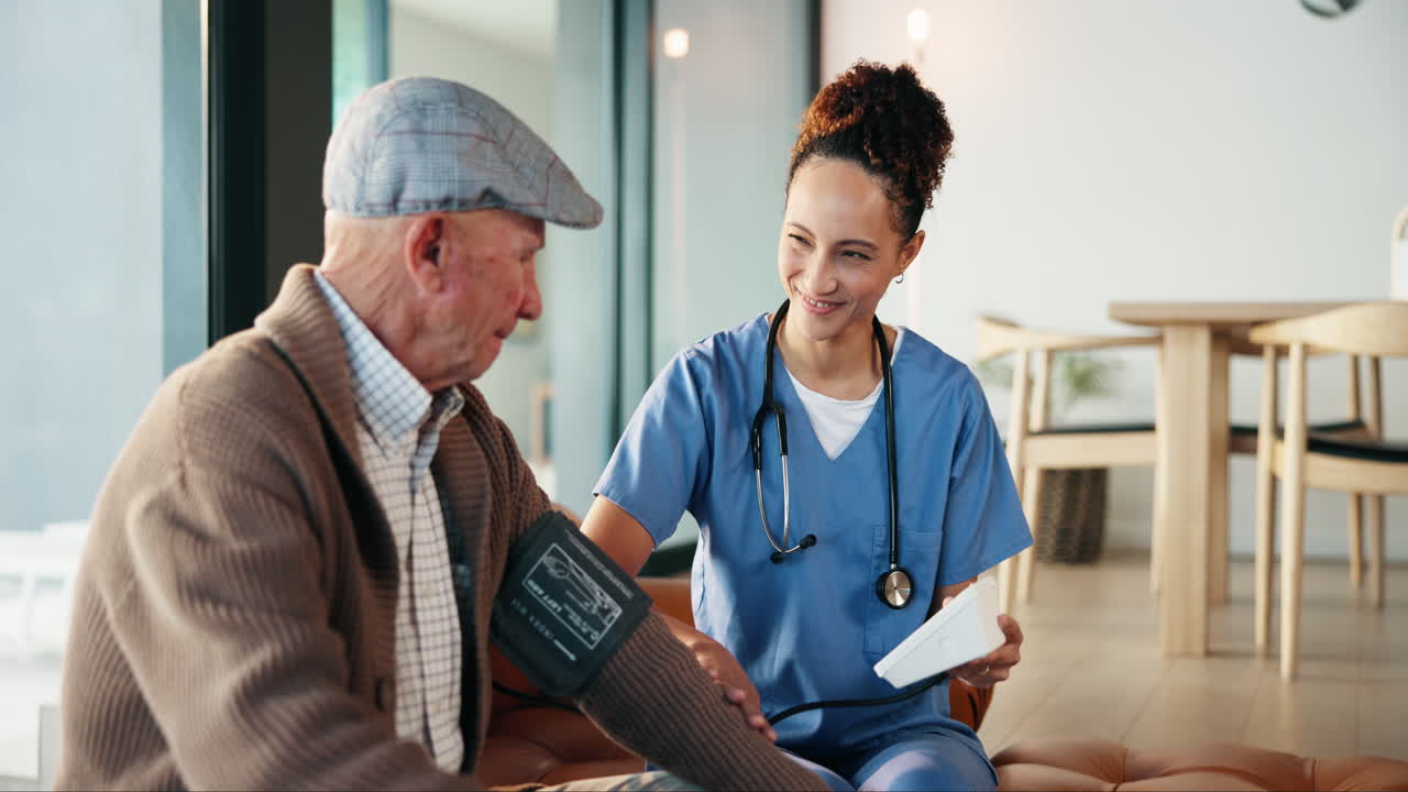 Nurse Checking Blood Pressure of Elderly Man at Home