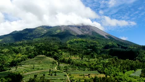 majestic active volcano mount merapi, indonesia hidden in clouds, timelapse