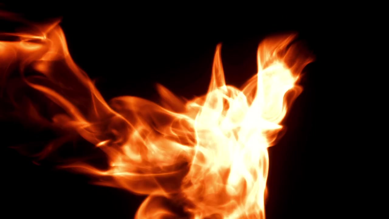 Abstrakte ildflammer brænder på sort baggrund